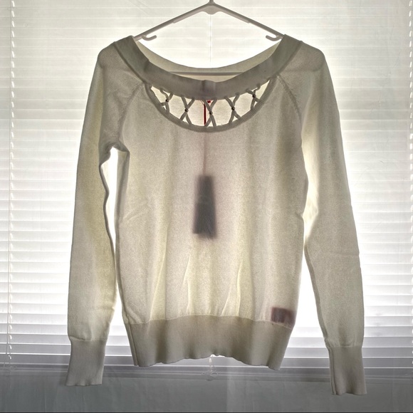 Jennifer Lopez Criss Cross Cut Out Off-White Sweater - Picture 3 of 12